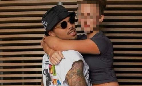 Heartbroken Man Dumps Fiancée After Posing With Chris Brown in a Saucy Viral Photo 