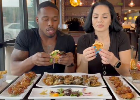 Food influencers were hit by a car while reviewing a burger inside a restaurant